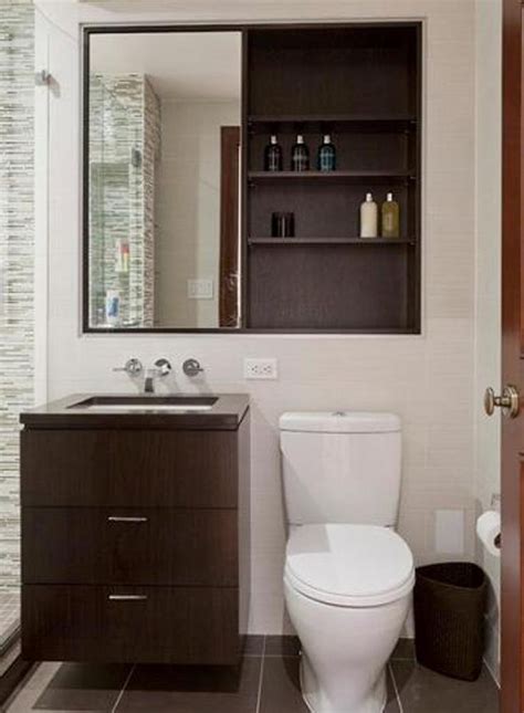 The mirrors also make your bathroom look bigger and brighter by reflecting light and adding a feeling of openness to the space. mirror over toilet | ... Wood Bathroom Medicine Cabinets ...