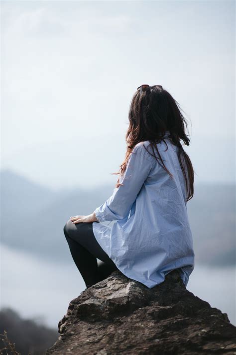 Girl Sitting On Rock Splitshire