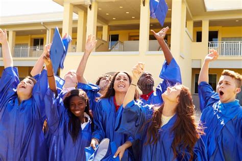 Group Of High School Students Celebrating Graduation Stock Image