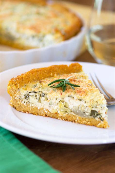 Make sure to make the parchment flush with the crust and fill the pie with pie weights, rice, lentils, or beans. Artichoke Rosemary Tart with Polenta Crust - Queen of My ...