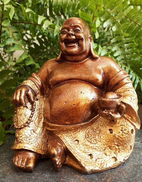 why do they always depict buddha on having a big belly does it represent or symbolize something