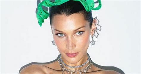 Bella Hadid Poses Topless With Crystals Over Bare Chest And Leaves