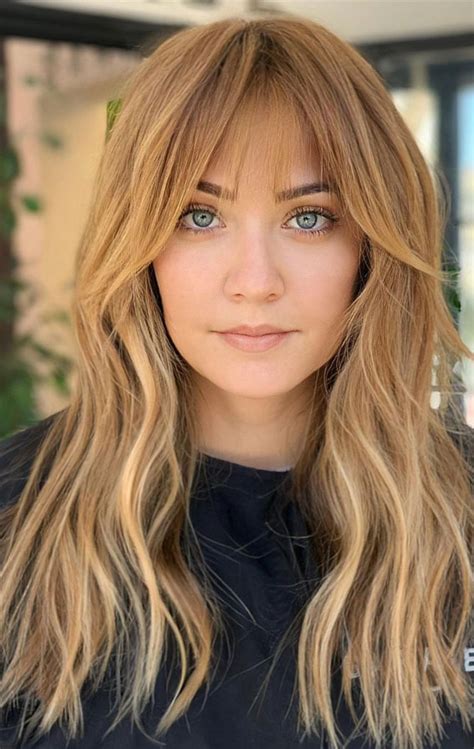 Create blonde highlights to obtain more texture and build some waves to achieve. Cute Haircuts And Hairstyles With Bangs : Blonde Curtain bangs