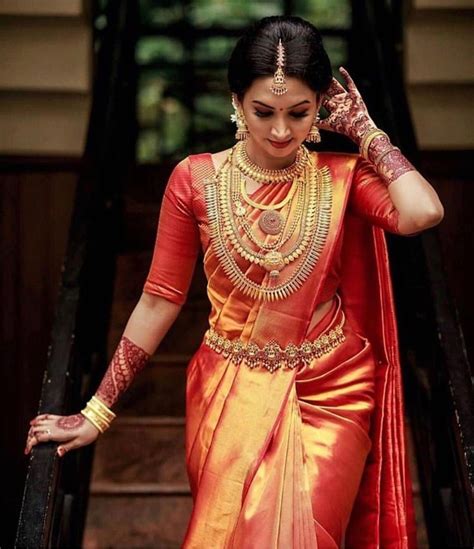 Pin By Angelina Joseph On Bride Indian Bridal Sarees South Indian Bride Saree Bridal Sarees