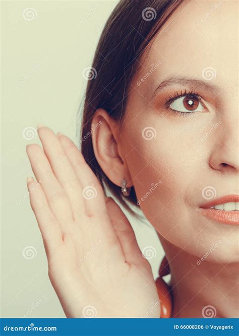 Gossip Girl Eavesdropping With Hand To Ear Stock Photo Image Of