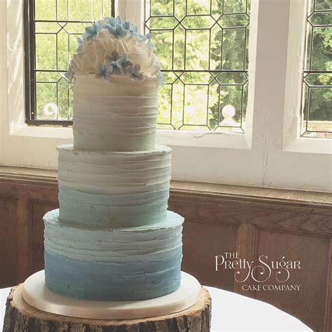 Blue Ombré Buttercream Wedding Cake With Ivory Sugar Roses And Blue