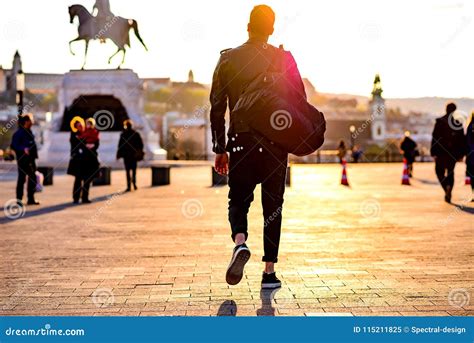 Young Man Walking In The Sunset Stock Image Image Of Light Handsome