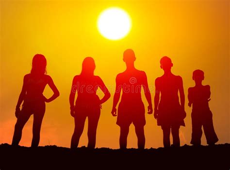 Silhouettes Of Boys And Girls Hugging On The Beach Stock Photo Image