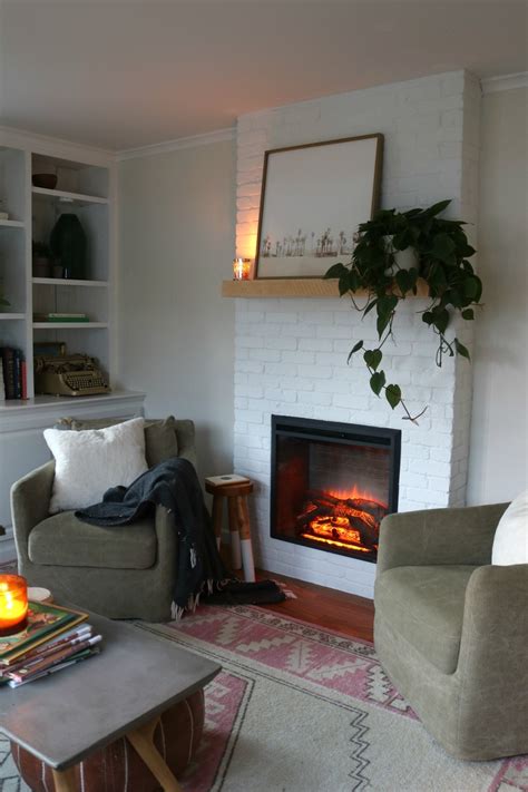 White wash brick fireplace painted brick fireplaces fireplace redo fireplace makeovers white mantle fireplace whitewash fireplace ideas brick fireplace remodel fireplace hearth. Fireplace Reveal- Our Electric Brick Fireplace - Nesting ...