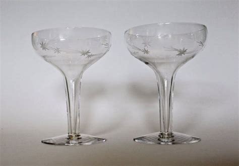 Set of 6 starburst etched glass champagne coupe glasses. A Pair of Vintage Hollow-Stem Coupe Champagne Glasses ...