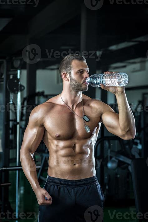Man Drinking Water In Gym 939960 Stock Photo At Vecteezy
