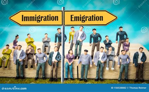 Street Sign Emigration Versus Immigration Stock Photo Image Of