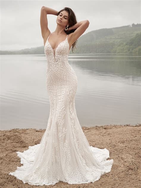 Spaghetti Strap Beaded Lace Fit And Flare Wedding Dress With Open Back And Dramatic Train