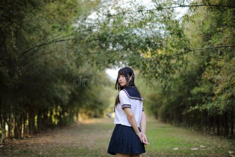 Portrait Of Beautiful Asian Japanese High School Girl Uniform Looking