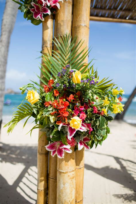 Bright Tropical Wedding Arch Floral Arrangement On St