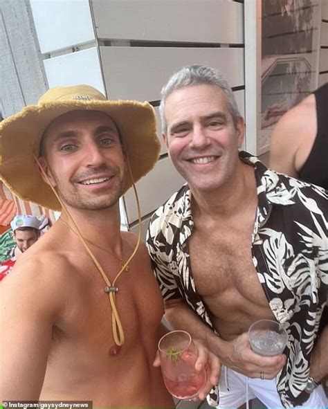 bravo star andy cohen 54 flashes his chest in an open hawaiian shirt as he attends a gay pool