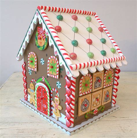 Outline and decorate gingerbread figures, trees, stars and other cookies. Christmas Gingerbread House Advent Calendar By Little Ella ...
