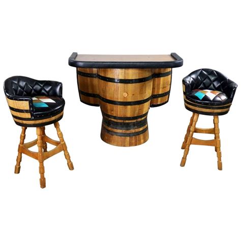 An important design element in these bar stools are stability and strength. Midcentury Whiskey Barrel Bar and Swivel Bar Stools by ...