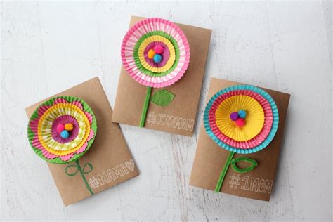 Make a super cute homemade diy mothers day card using cupcake liners and pom poms! Easy-to-make DIY Cupcake Liner Flower Card Craft {Kids ...