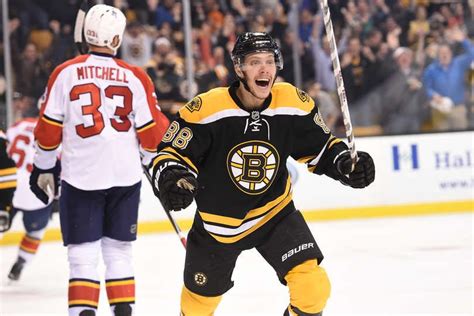 Boston bruins right wing david pastrnak (88) stands. David Pastrnak .....what a smile!!! Bruins vs. Panthers ...