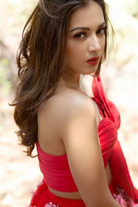 Capable of giving a sensation of heat or of burning, searing, or scalding working outside in the hot sun fried in hot oil. Catherine Tresa Hot Photoshoot Stills In Red Dress