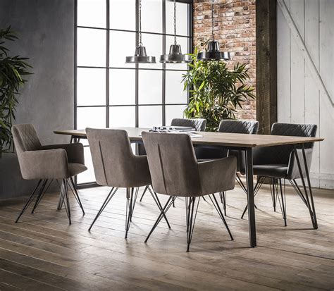 Table de salle à manger design en bois avec piétement en acier Sarah