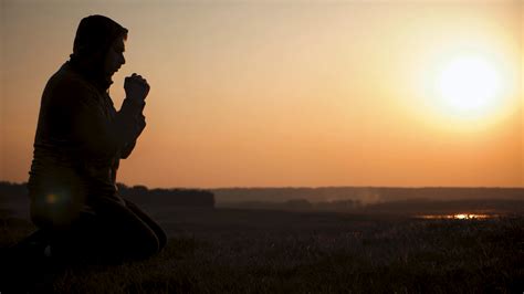 Young Man Praying At Sunset Seeking Solace Stock Footage Sbv 335043985