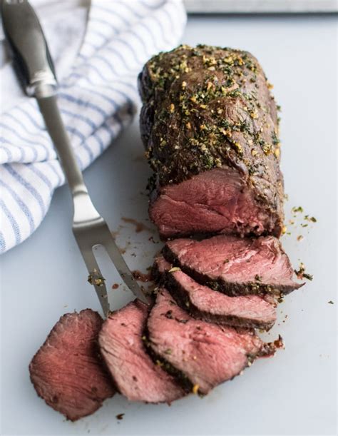 Combine the oil, mustard, garlic, rosemary, thyme, salt, and pepper to form a paste and spread liberally over the beef. Herb Crusted Roast Beef with Horseradish Sauce | Carolyn's ...