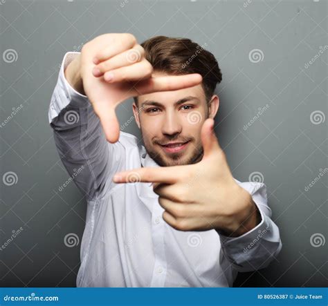 Cheerful Young Business Man Gesturing Finger Frame Stock Image Image