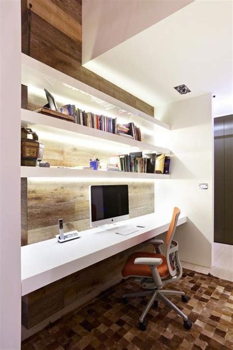 Long Built In Shared Desks Along The Wall In Open Space