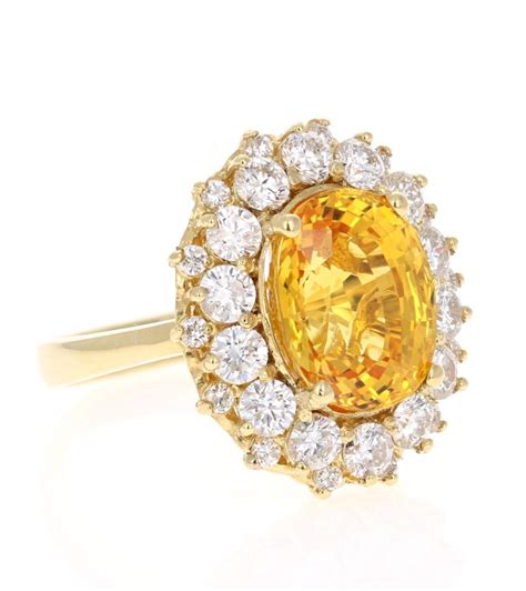 Latest gold stone ring design with price and weight/gold ring with price. 9.19 Carat Yellow Sapphire and Diamond 18 Karat Yellow ...