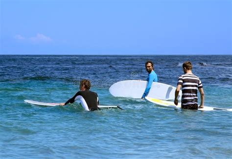 Surfers In Ocean With Surf Boards Stock Photo Image Of Hobby Swim