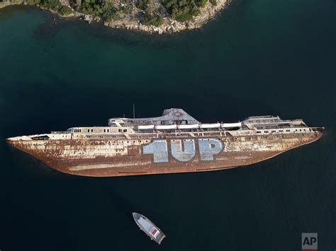 Greece Hauls Abandoned Half Sunken Ships Out Of The Sea — Ap Images