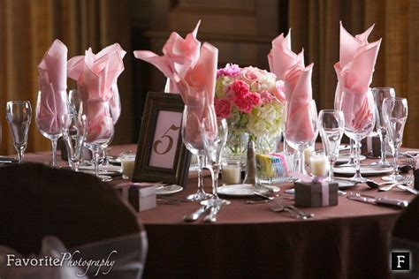 A strapless red wedding dress with a layered full skirt is a gorgeous idea for a greenery, red, pink and white blooms are great to decorate the space, you can go for overhead decorations, too. Pin by Favorite Studios on Wedding Details | Brown wedding ...