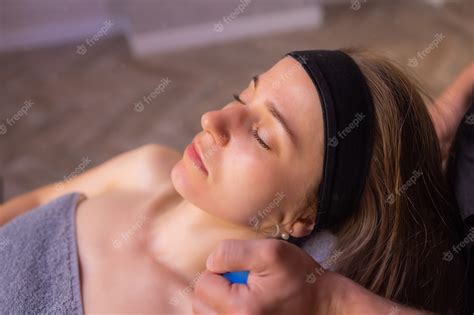Premium Photo Woman Receives Facial Cupping Massage Facial