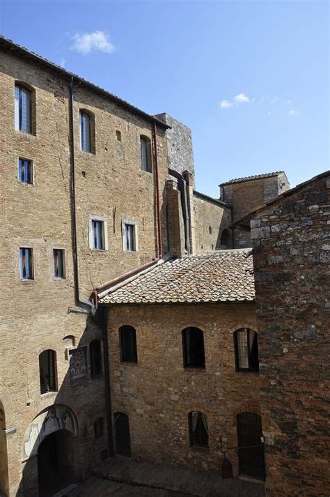 palazzo comunale building courtyard from the medieval san gimignano hilltop town tuscany region