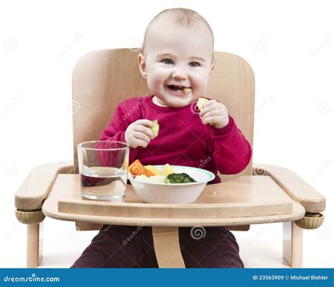 Young Child Eating In High Chair Stock Image Image Of Supplementary
