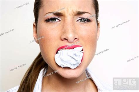 Woman With Paper Ball Stuffed Into Her Mouth Stock Photo Picture And Rights Managed Image Pic