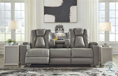 Mancin Gray Reclining Sofa With Drop Down Table From Ashley Furniture