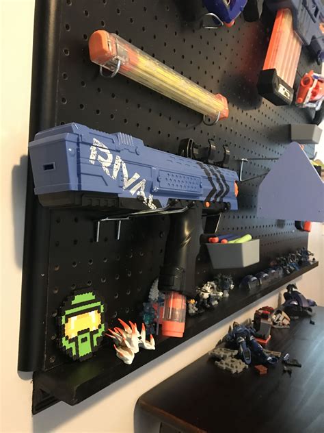 Gun case manufacturers understand that some of us wish to be more discreet. Build a nerf gun peg board wall! | Boys bedroom in 2019