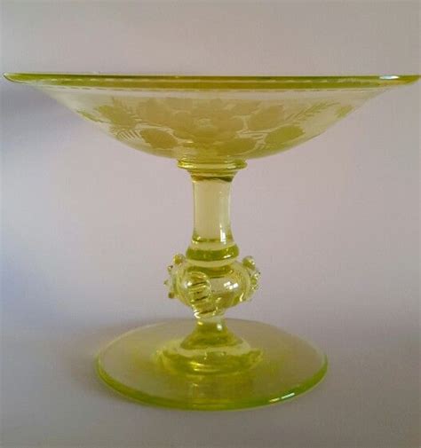 They look to me like celery vases, but that would make them victorian. Antique Uranium Glass Compote, Bohemia c. 1880