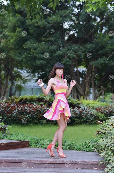 beautiful and sex asian girl shows her youth in the park stock image image of asian sweet