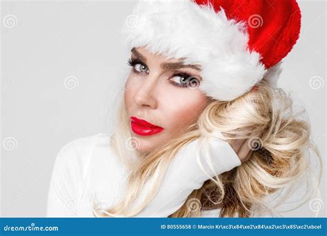 Beautiful Blonde Female Model Dressed As Santa Claus In A Red Cap Stock Photo Image Of Lips