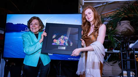 Dr Sylvia A Earle Presents Award To Amber Sparks Of Blue Latitudes