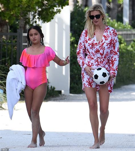 Ivanka Trump Models A Patterned Bathing Suit For A Day On The Beach