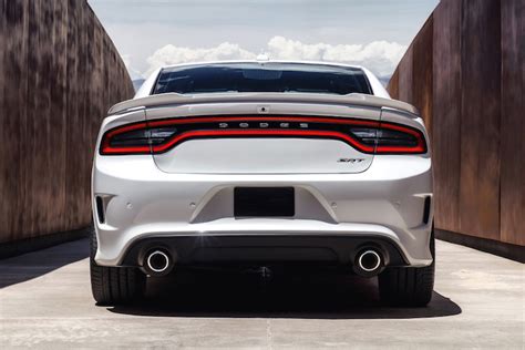 The dodge srt hellcat sounds great and does awesome burnouts but the traction control is basically useless as is evident in this vid. Charger-Hellcat-White