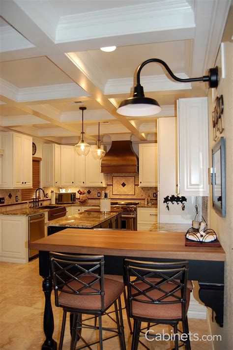 Paired together, the two are matched perfectly, with the hardware's bronze. So many design elements to take in! From the coffered ...
