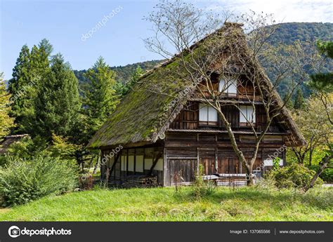 Japanese homes tend to be small and situated close to one another, whether in urban or rural settings. Japanese traditional house — Stock Photo © leungchopan ...