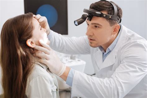 Confident Ent Doctor Doing Throat Exam Stock Image Image Of Hospital