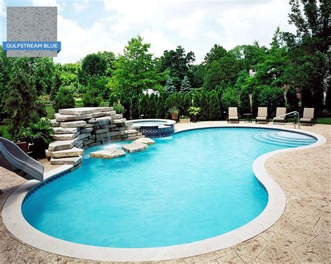 When the sky is clear and water chemistry is on target, white plaster will make your pool water look a refreshing blue color. This pool's curved shape keeps the water moving around the ...